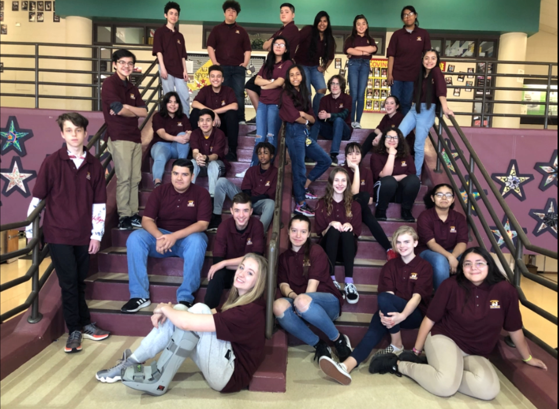 Covington Colt Band students on the stairs at school